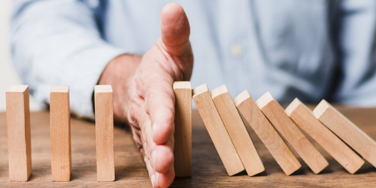 businessman-stopping-crisis
