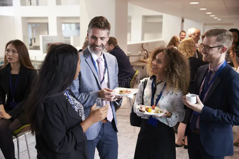 delegates-networking-conference-lunch-break-79847377