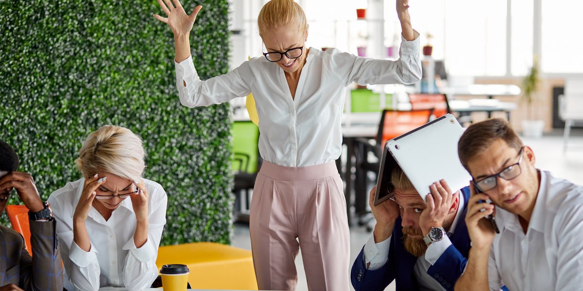 dissatisfied-woman-lost-temper-with-anger-work-stand-shouting-due-bad-work-result-employees-are-humiliated