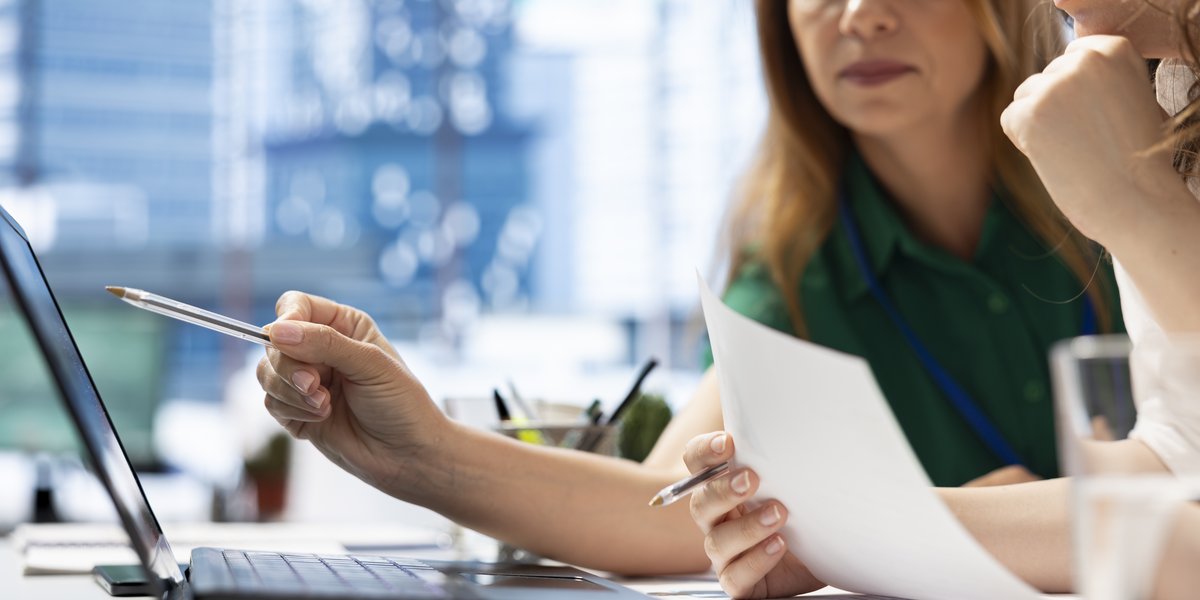 employers-using-laptop-device-find-qualified-candidates-through-job-postings