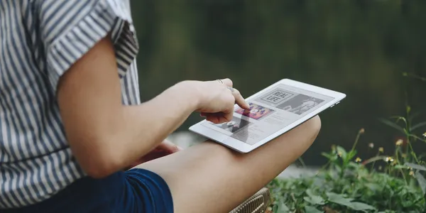 woman-alone-nature-using-digital-tablet-with-entertainment-application-screen-internet-c