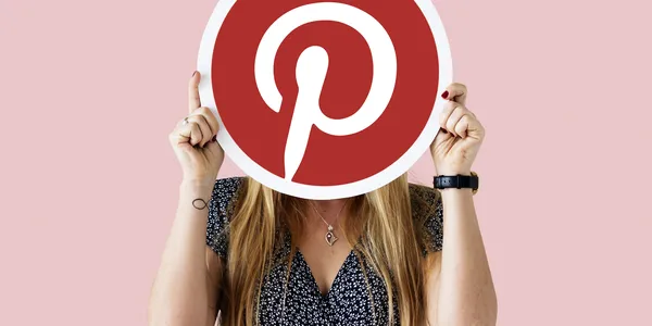 woman-showing-pinterest-icon