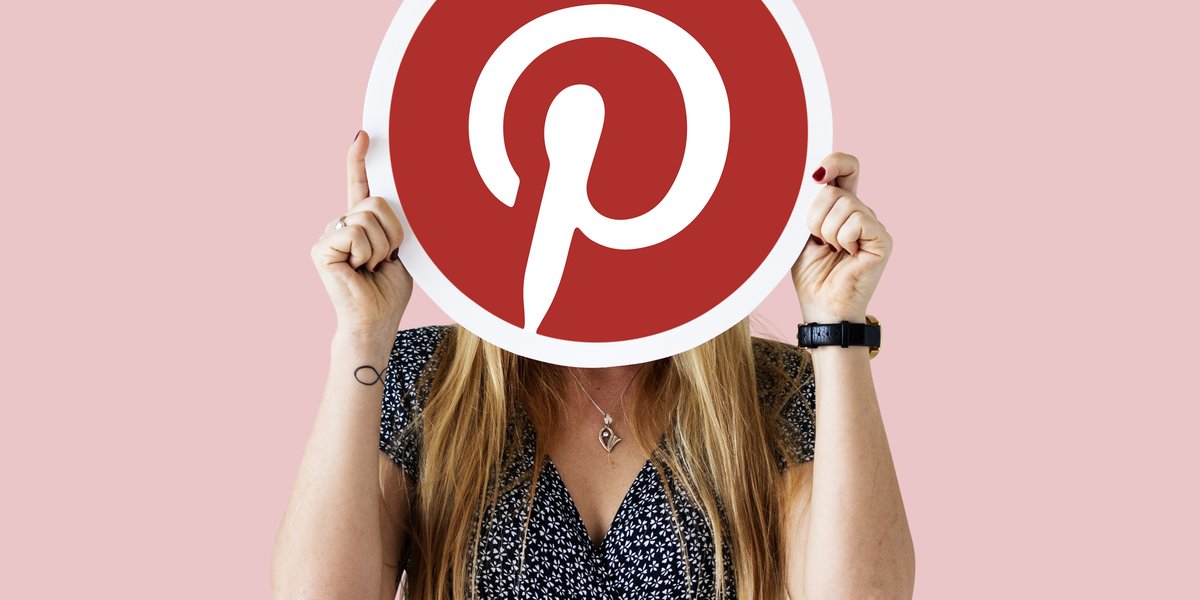 woman-showing-pinterest-icon